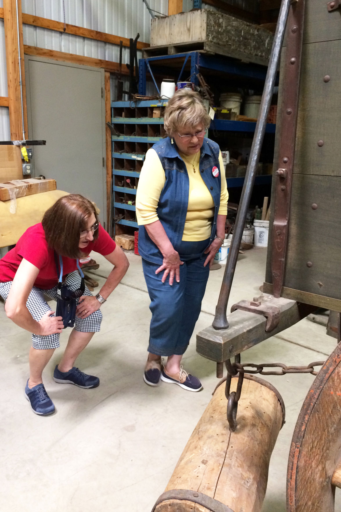 098 Dallas Wellensiek and Carolyn Frazier examine the construction of a wagon.JPG